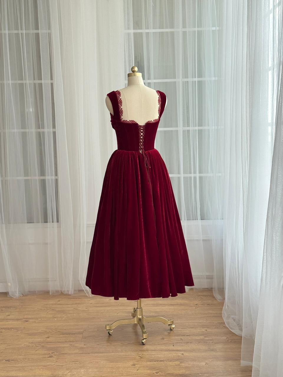 Red midi dress with straps and embroidered lace