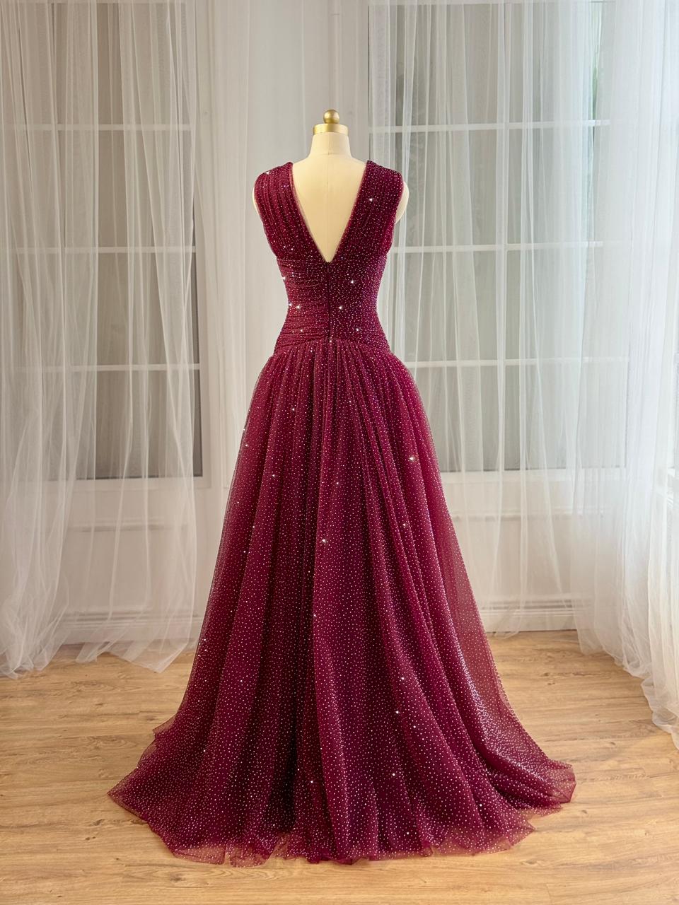 Red A-Line gown with beading, v-neck and no sleeves