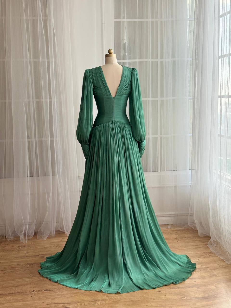 Green A-Line gown with long sleeves and. v-neck