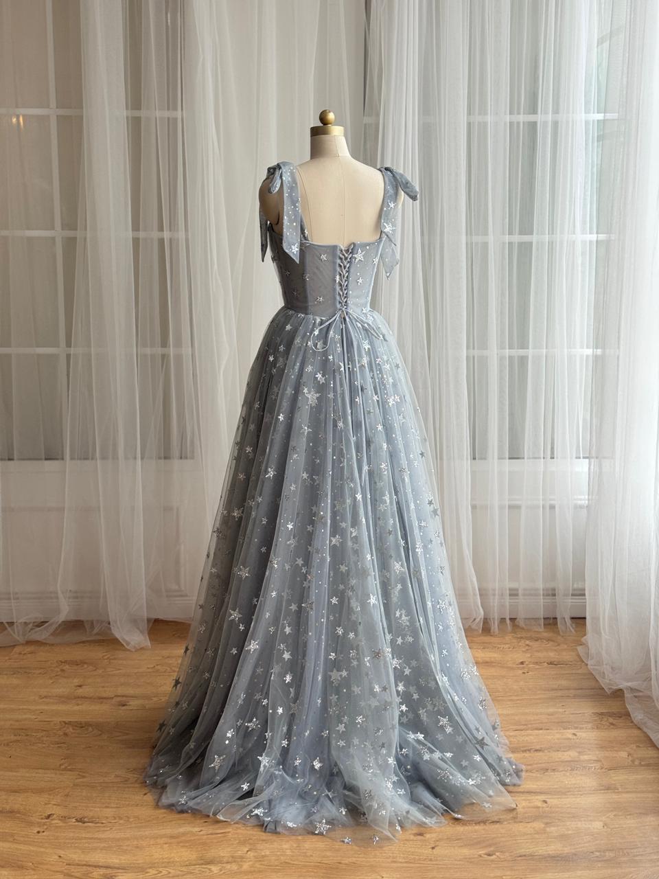 Silver A-Line gown with bow straps, embroidered bow and starry fabric