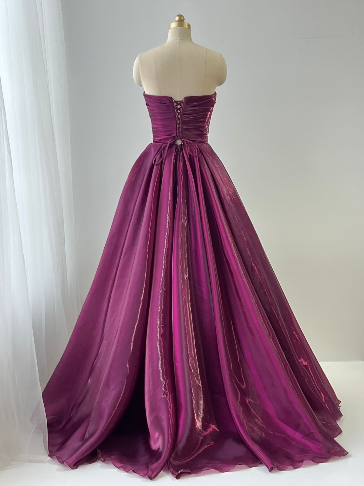 Red A-Line gown with taffeta fabric and no sleeves
