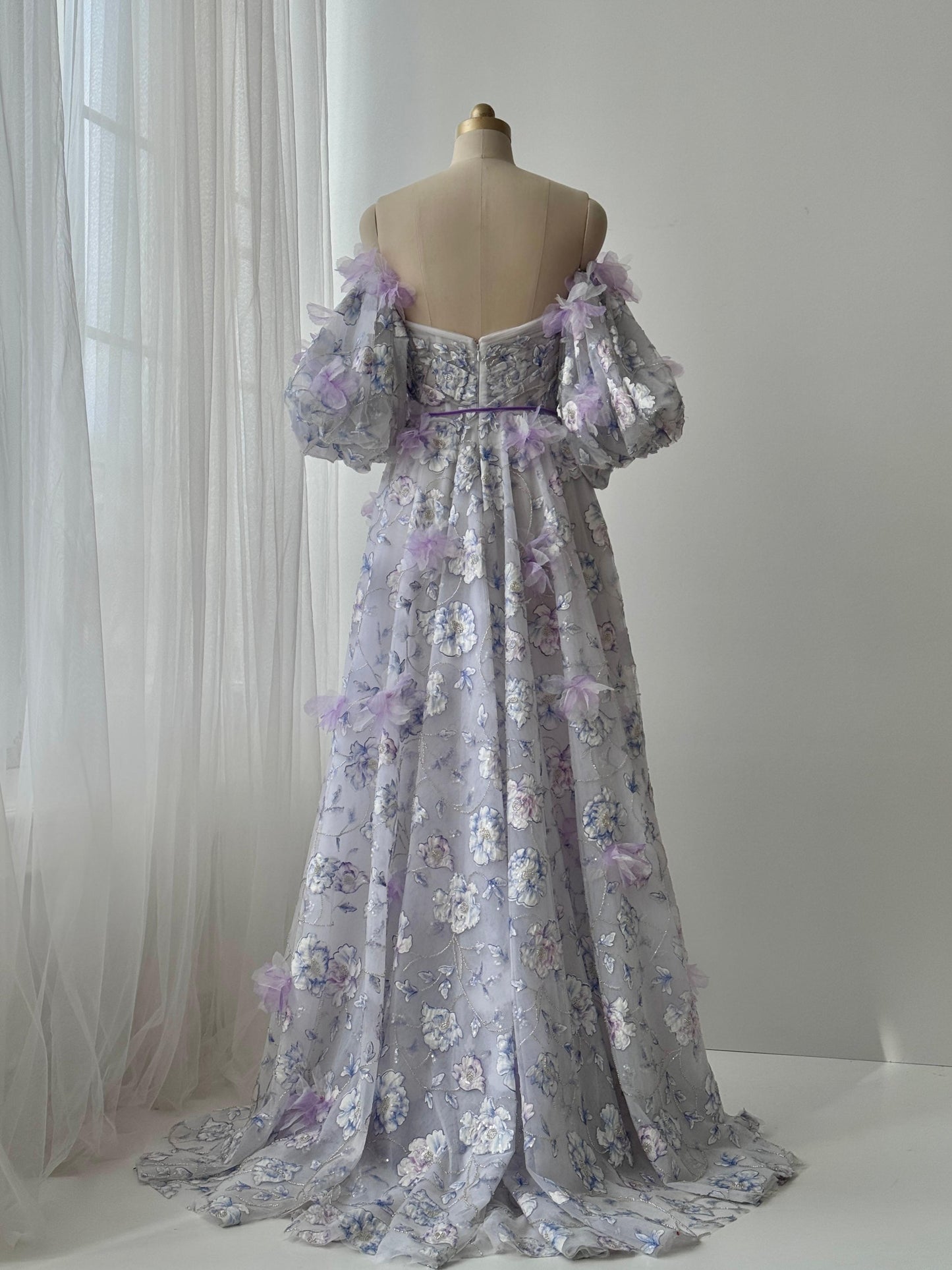 Purple A-Line gown with short off the shoulder sleeves, embroidery and v-neck