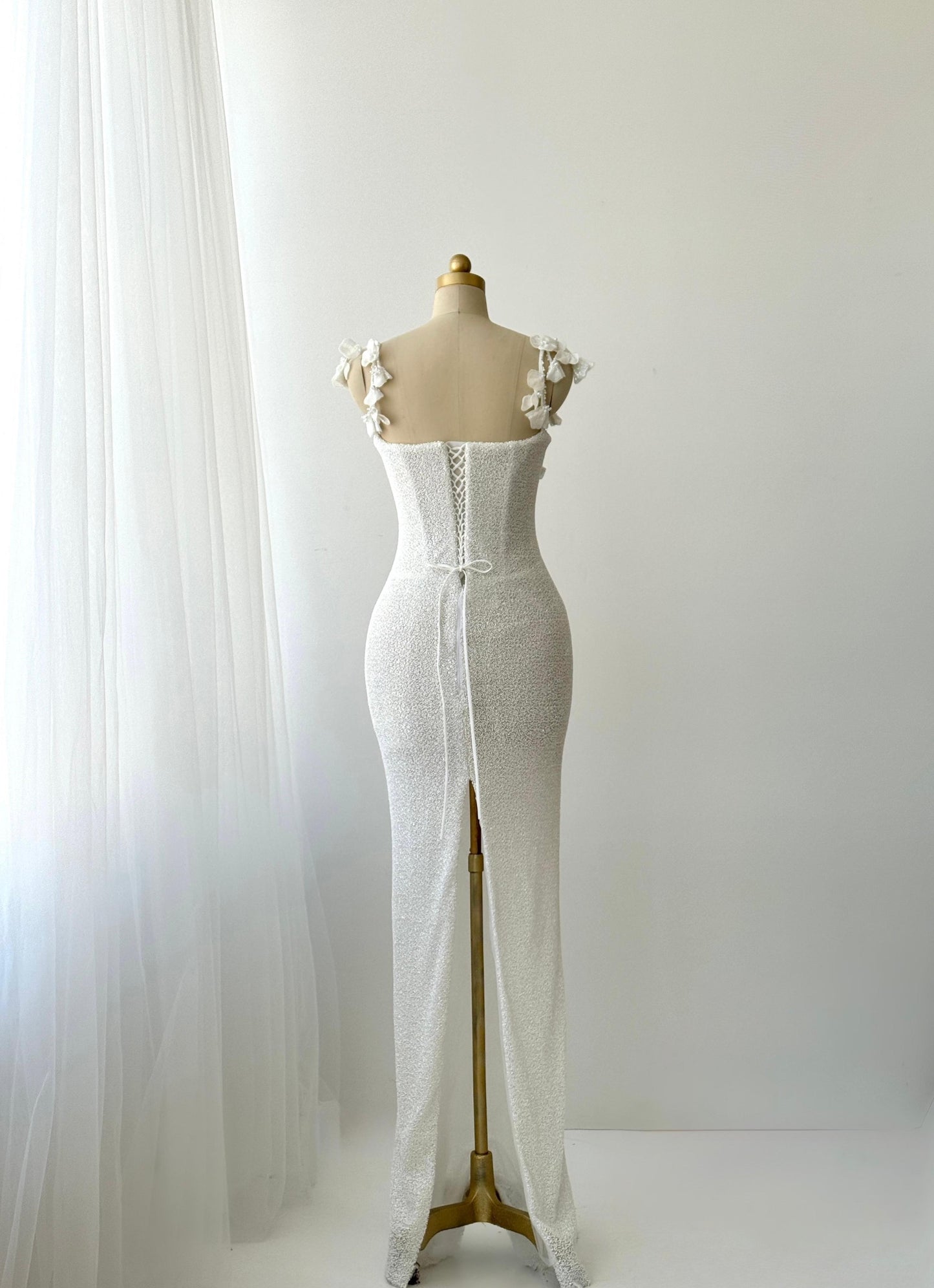 White Mermaid bridal gown with spaghetti straps and embroidery