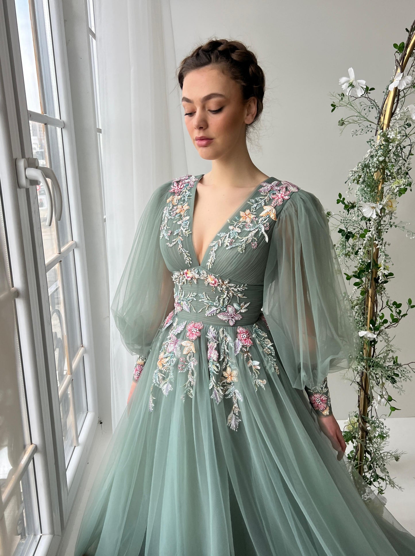 Green A-Line dress with v-neck, long sleeves and embroidery