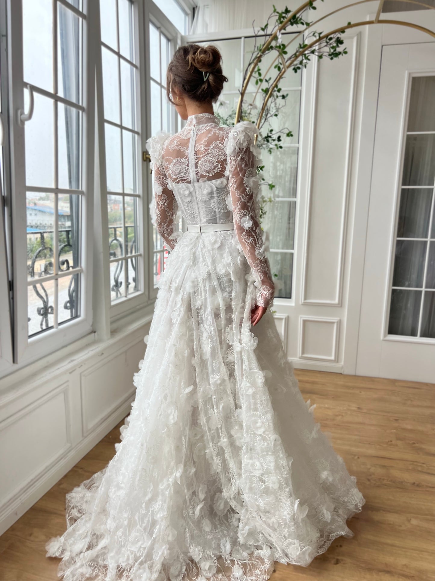 White bridal A-Line gown with long sleeves and embroidery