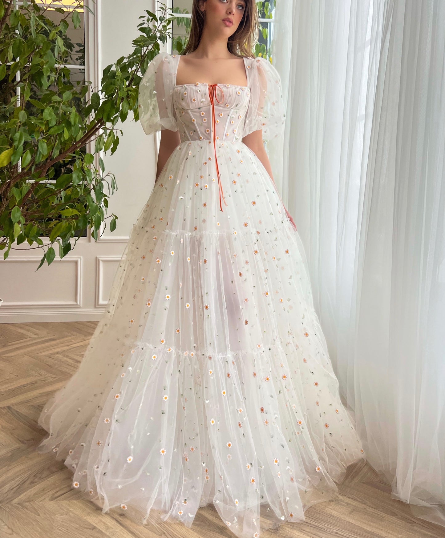 White A-Line bridal dress with short sleeves and embroidered daisies