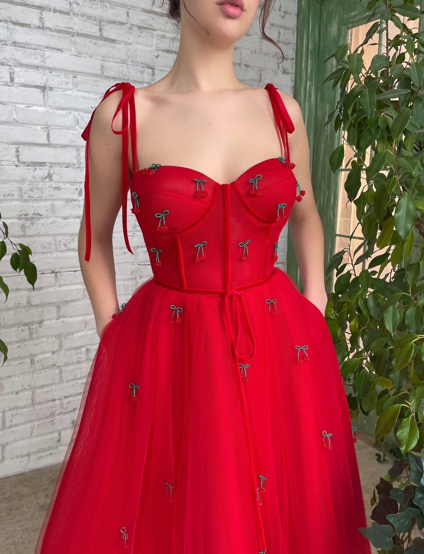 Red midi dress with embroidered cherries and straps