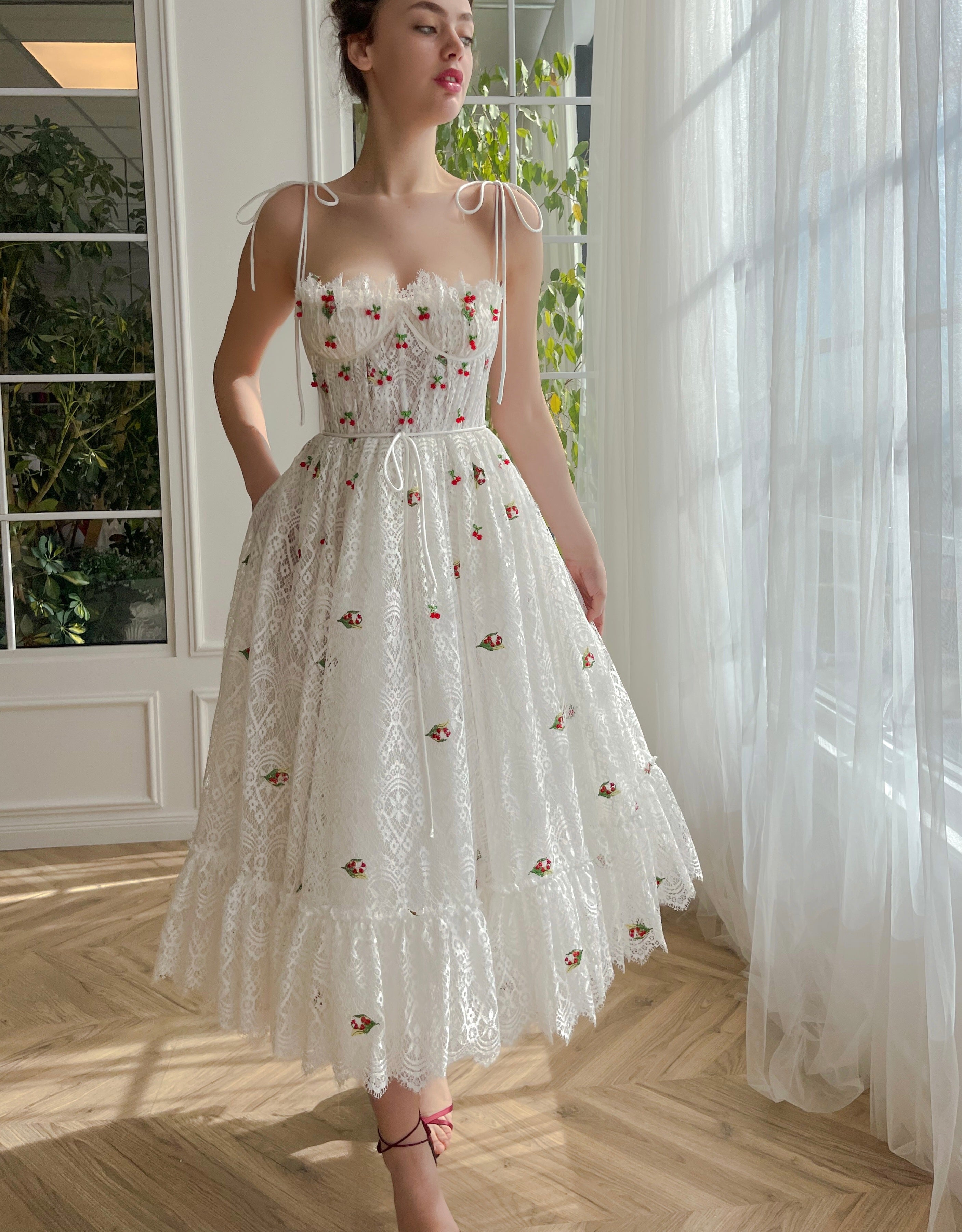 White midi bridal dress with spaghetti straps and embroidered cherries