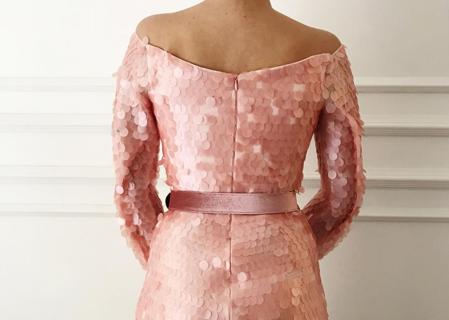 Pink mermaid dress with belt, sequins and long off the shoulder sleeves