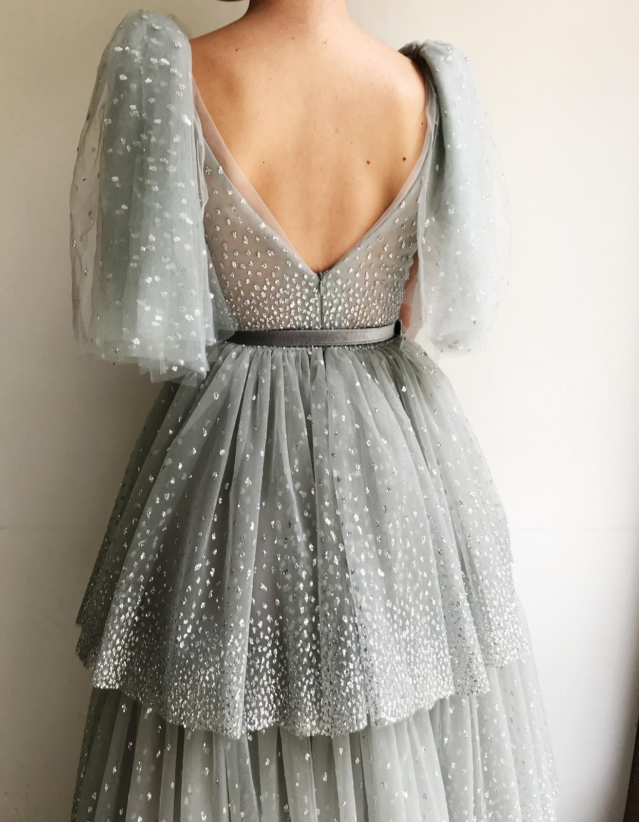 Grey A-Line dress with v-neck, no sleeves and belt