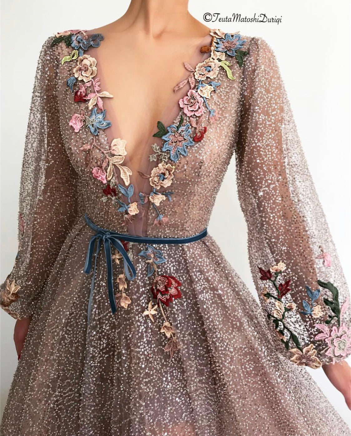 Purple A-Line dress with long sleeves, v-neck, belt and embroidery