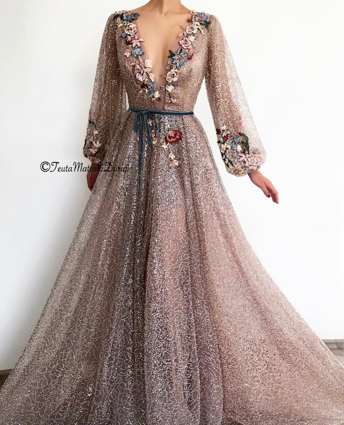 Purple A-Line dress with long sleeves, v-neck, belt and embroidery