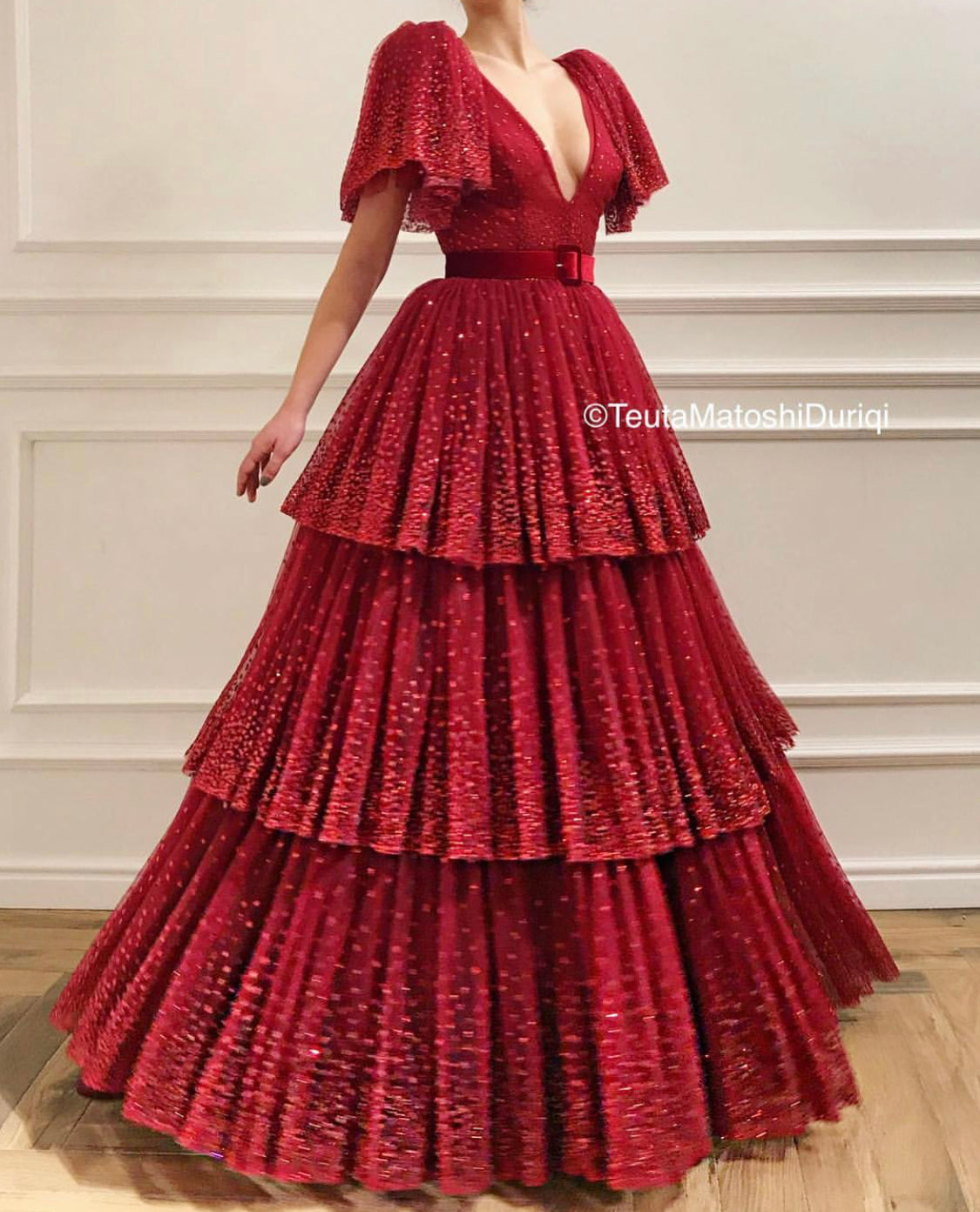 Red A-Line dress with v-neck, short sleeves and belt