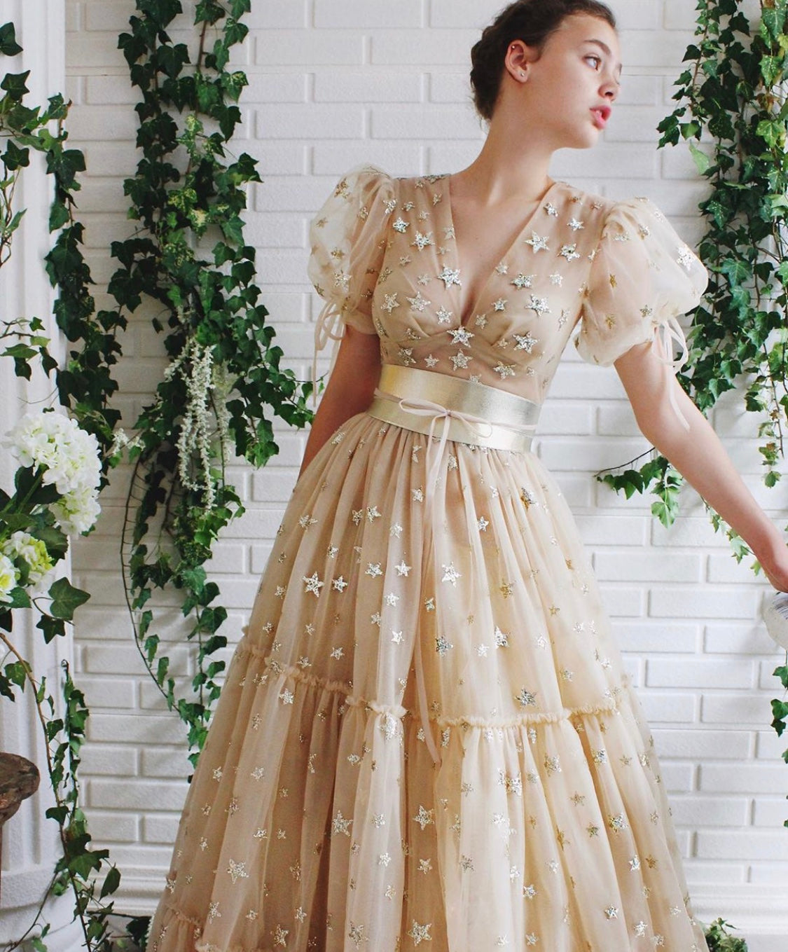 Beige A-Line dress with short sleeves, v-neck and starry fabric