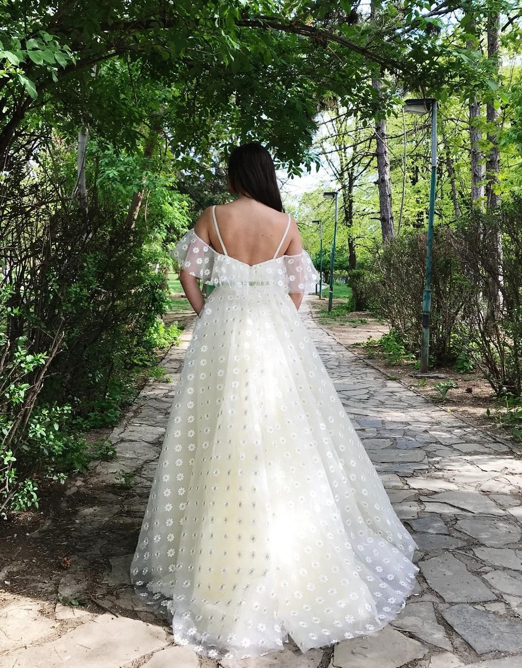 Beige A-Line dress with off the shoulder sleeves, spaghetti straps, v-neck and daisies