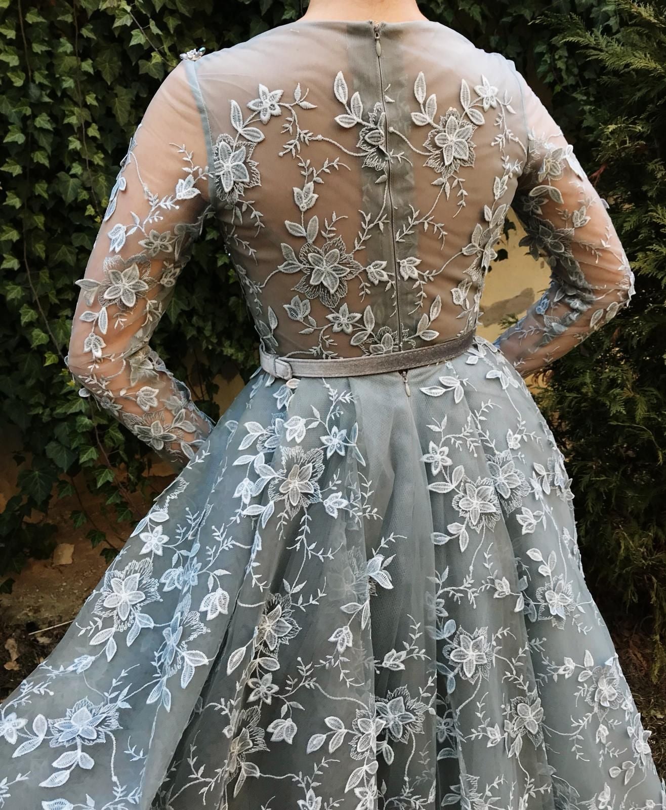 Grey overskirt dress with belt, long sleeves, lace and embroidery