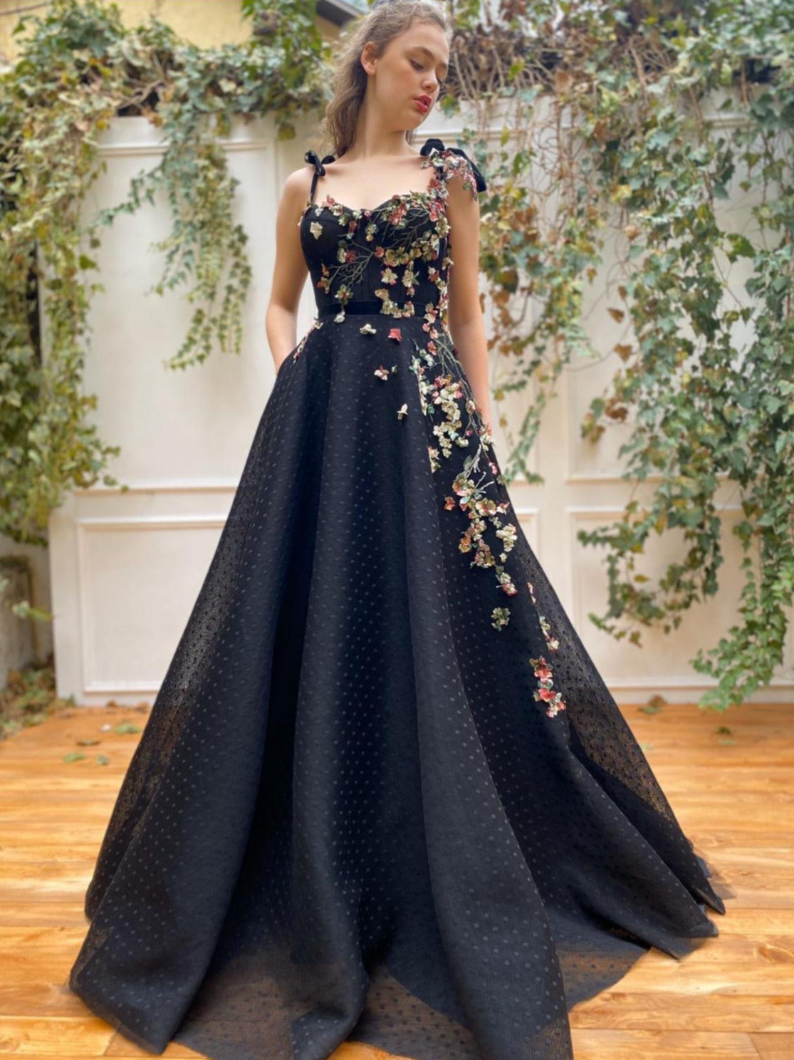 Black A-Line dress with dotted fabric, spaghetti straps and embroidery