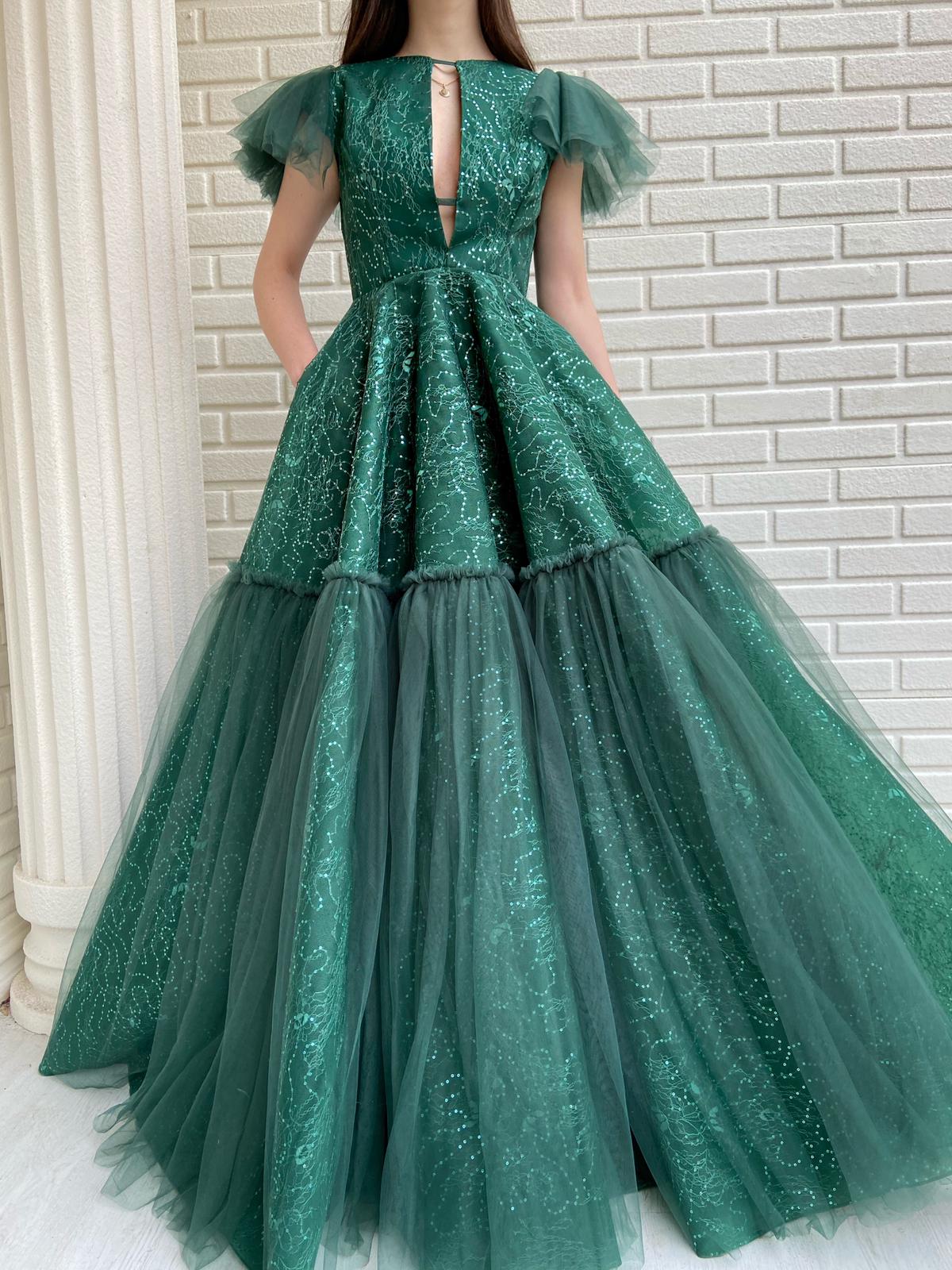Green A-Line dress with no sleeves and embroidery