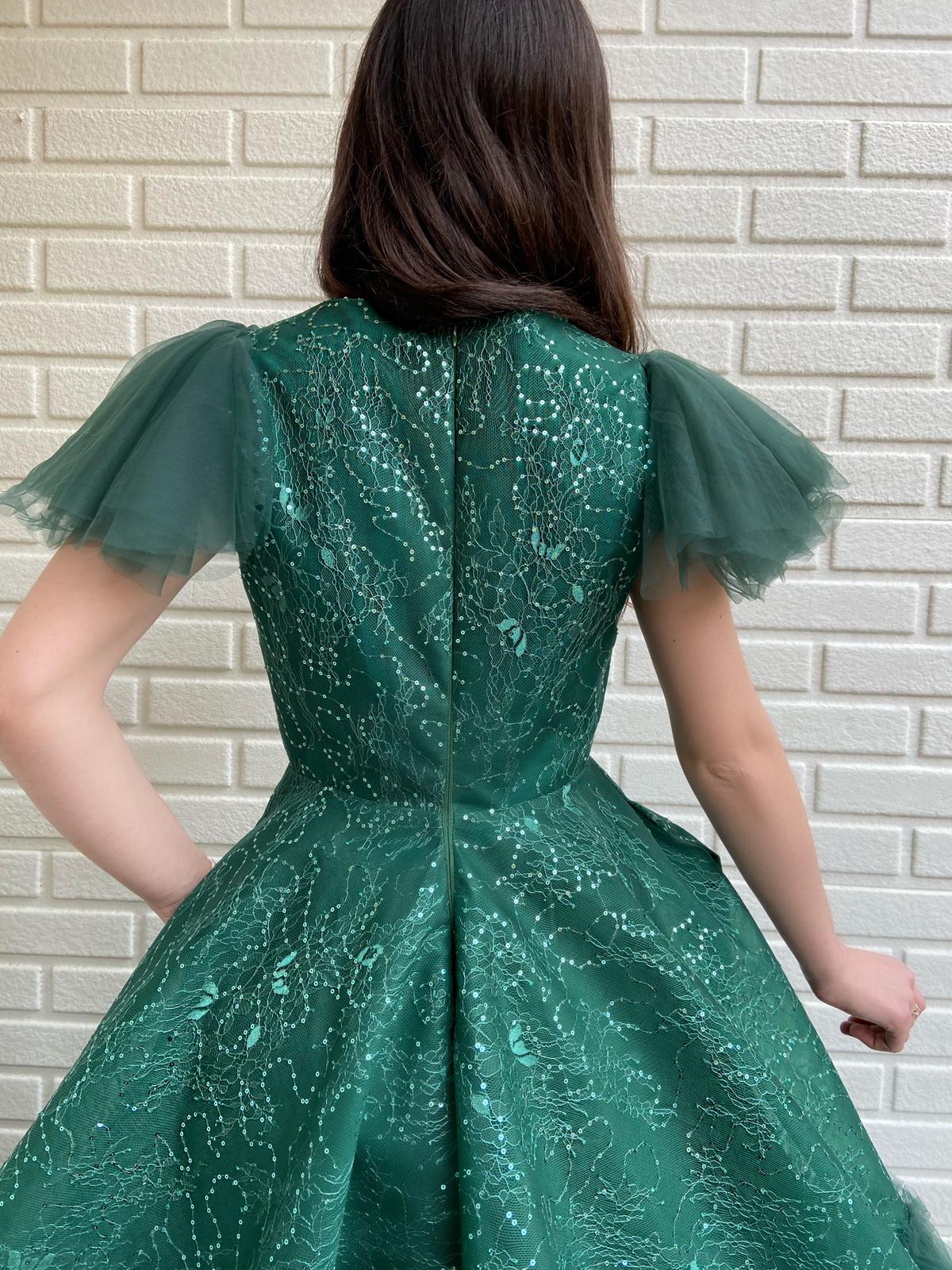 Green A-Line dress with no sleeves and embroidery