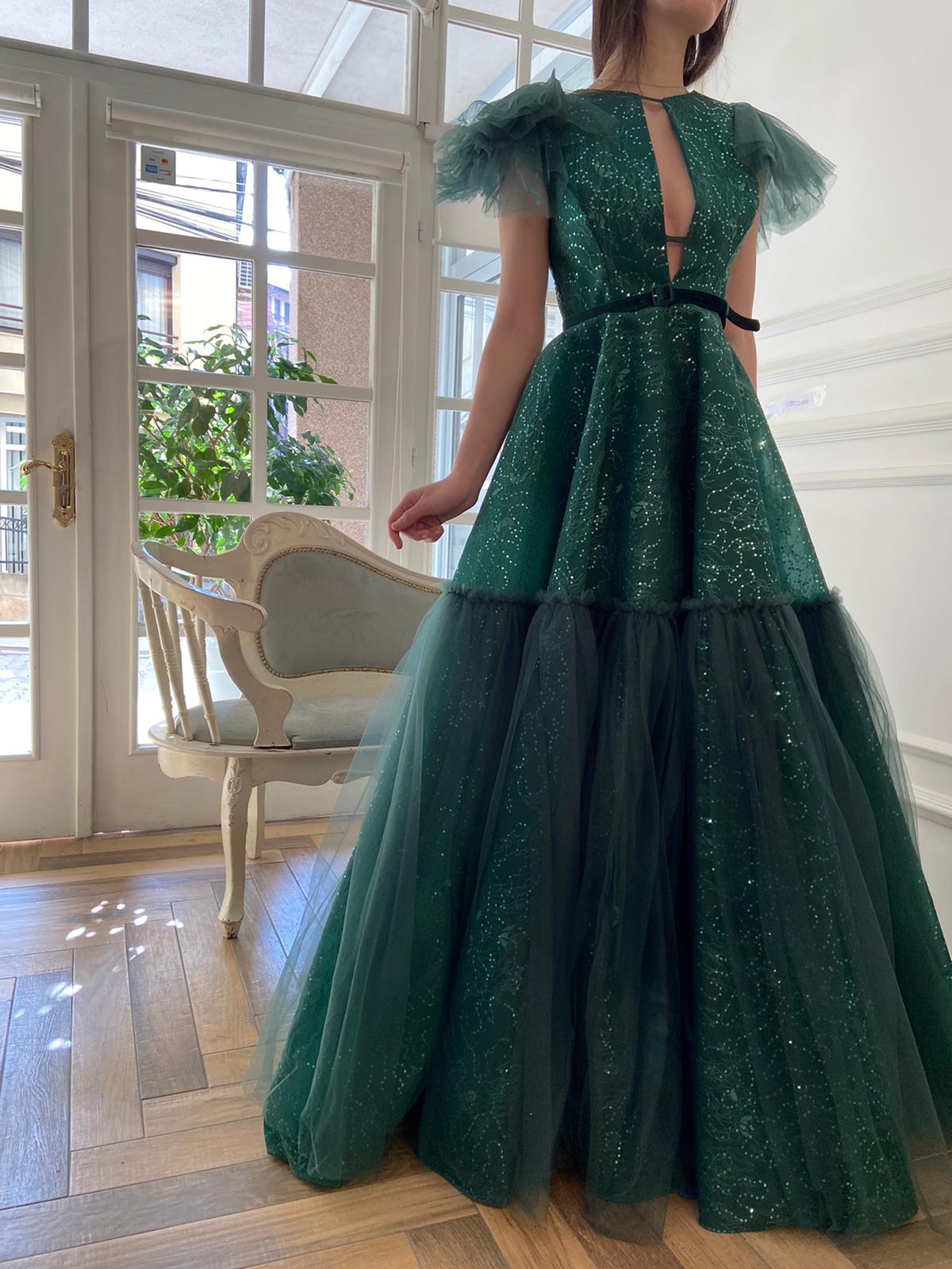 Green A-Line dress with no sleeves and embroidery