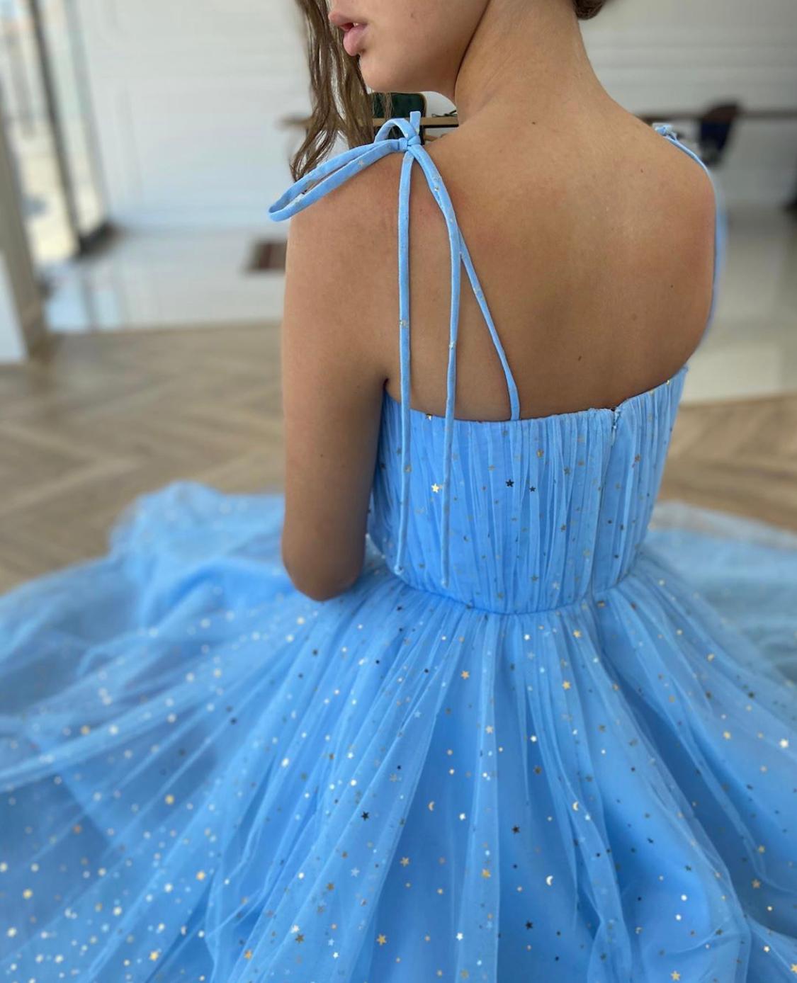 Blue midi dress with spaghetti straps and starry fabric