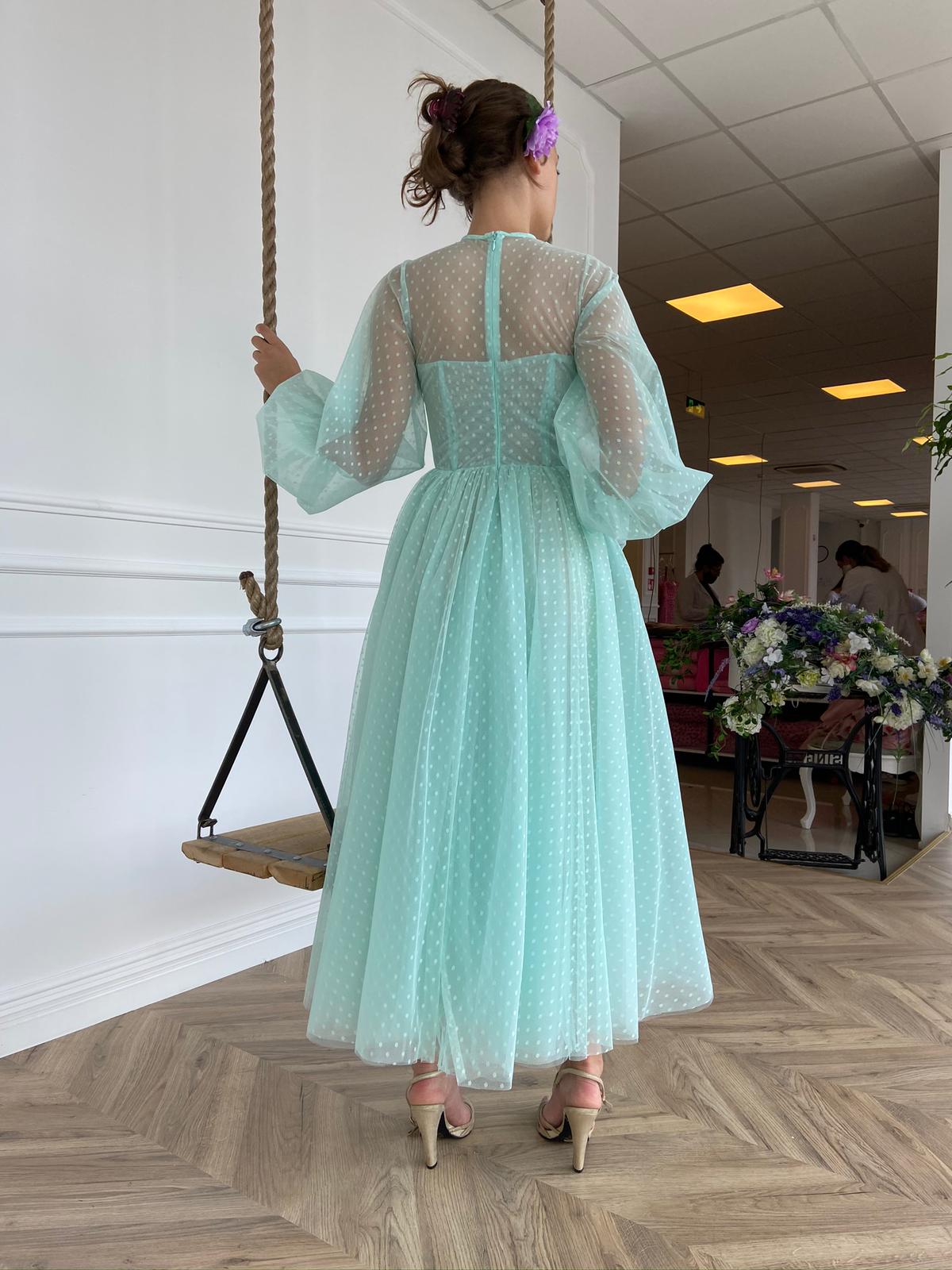 Green dotted midi dress with long sleeves