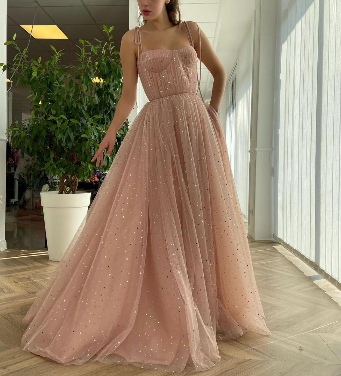 Pink A-Line dress with spaghetti straps and starry fabric