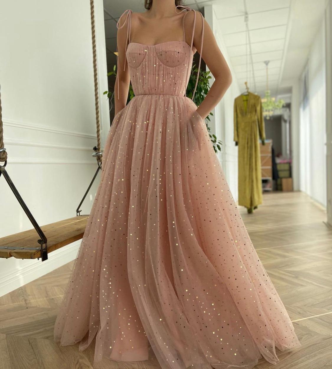Pink A-Line dress with spaghetti straps and starry fabric