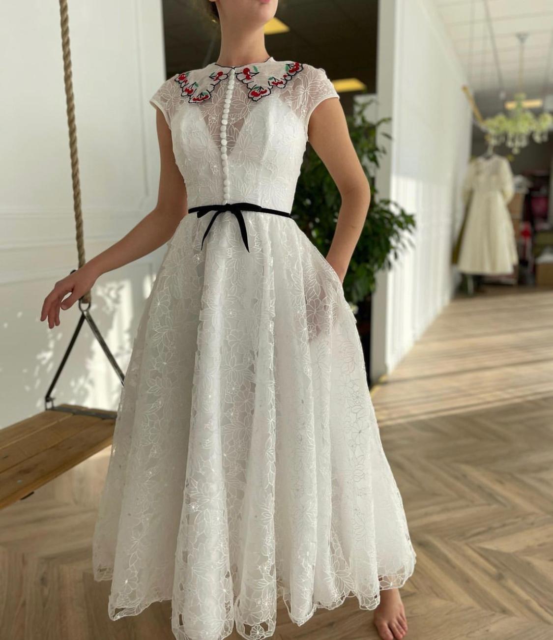 Midi white bridal dress with buttons, embroidered flowers and short sleeves