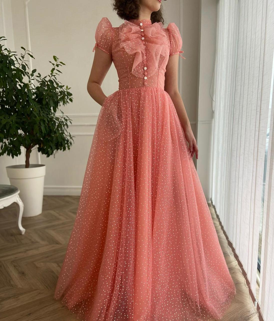 Pink A-Line dress with short cap sleeves and dotted fabric