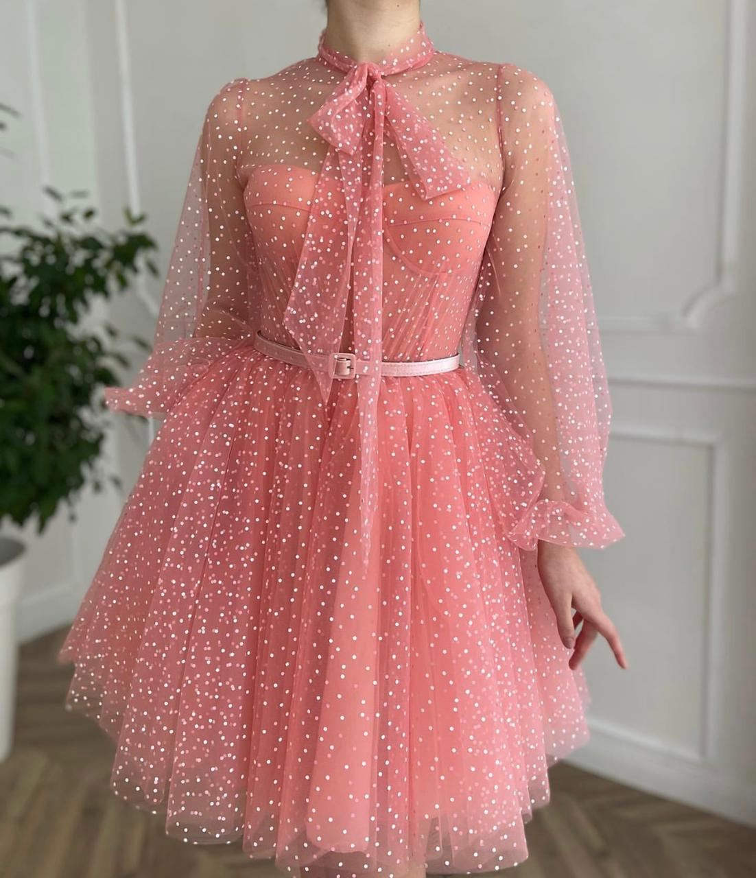 Pink mini dress with long sleeves and belt
