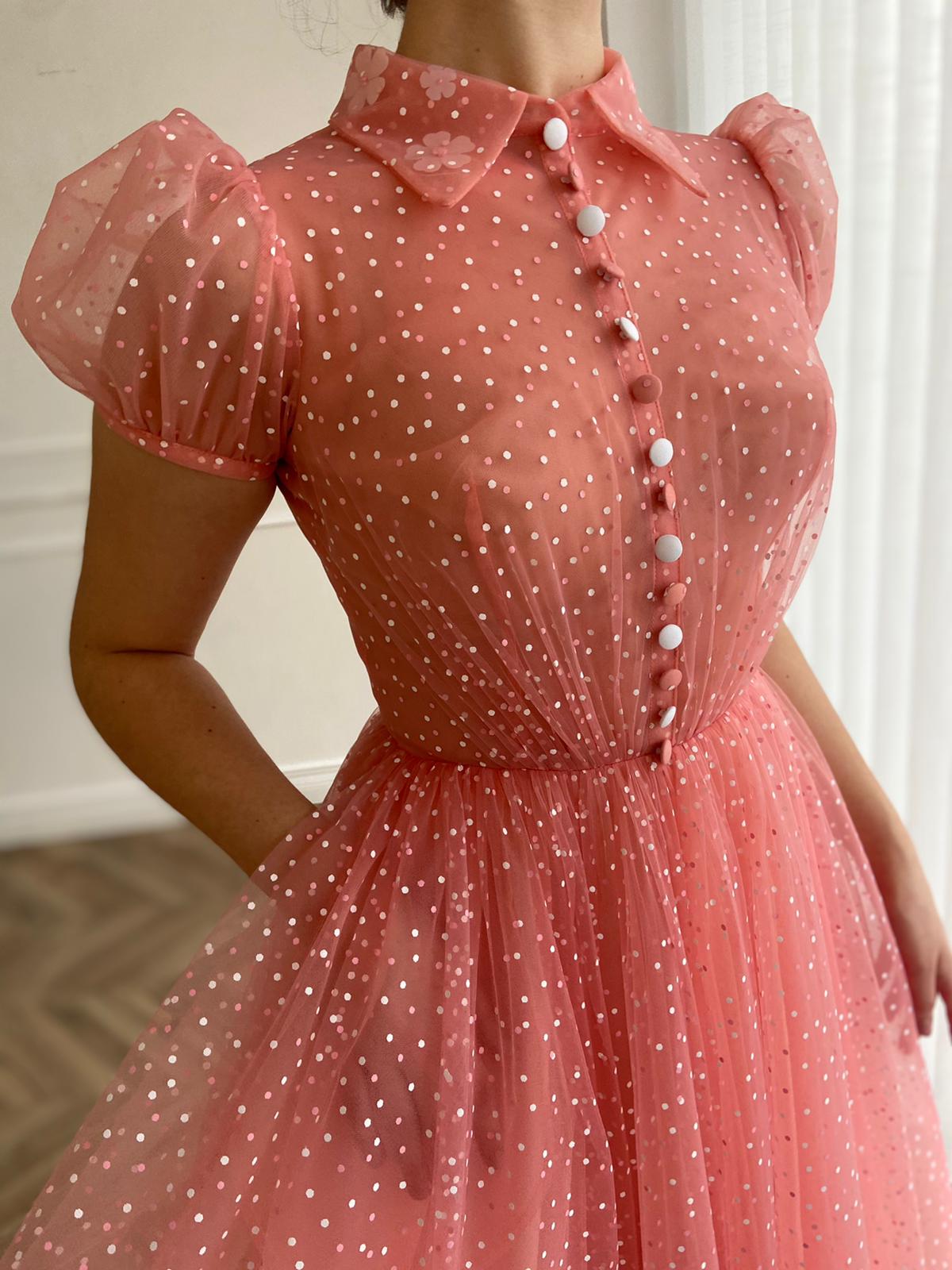 Pink midi dress with short cap sleeves and dotted fabric