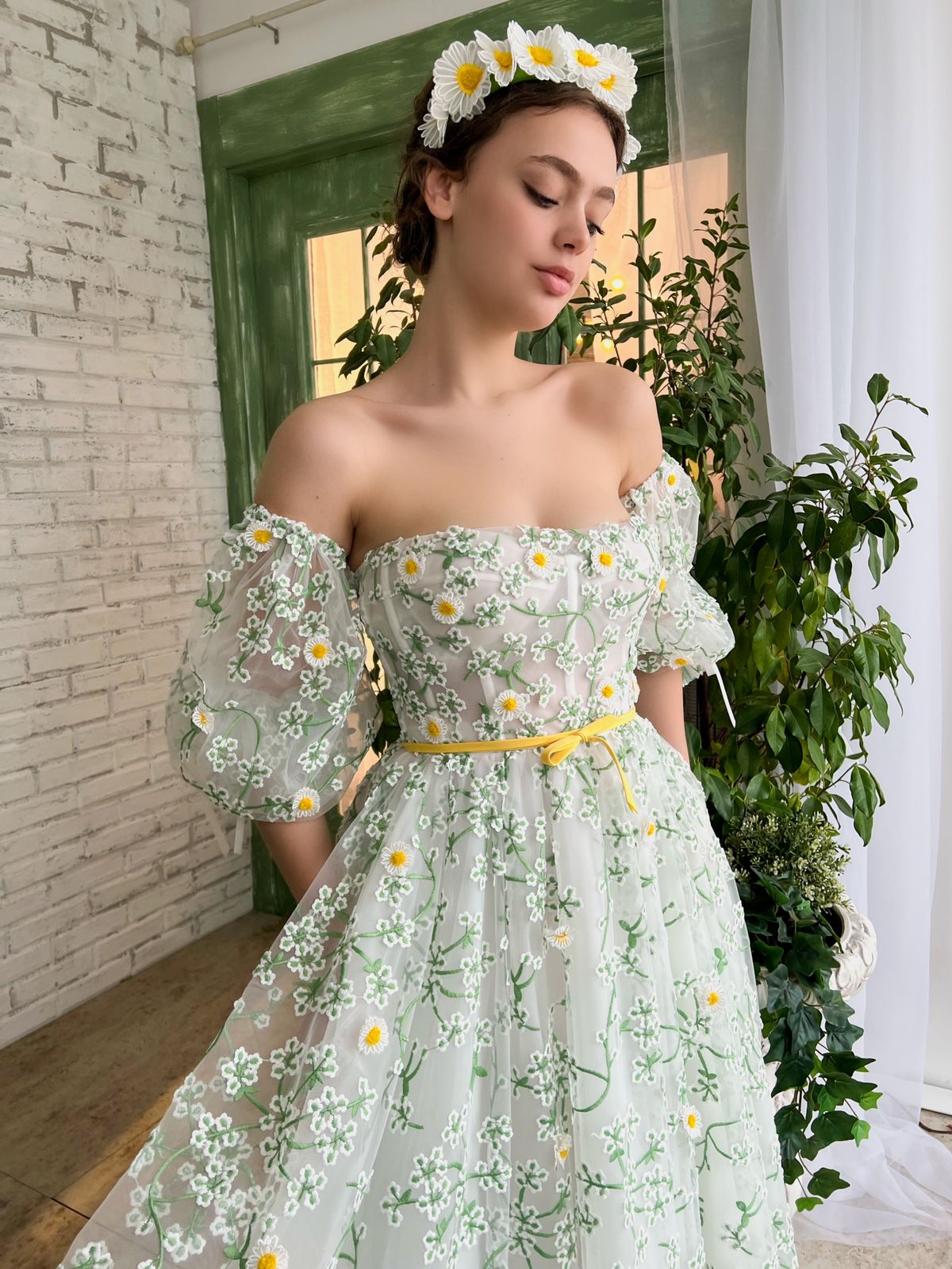 White and green midi dress with off the shoulder sleeves and daisies