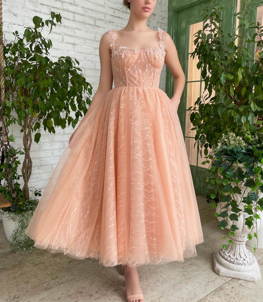 Peach midi dress with spaghetti straps and embroidery