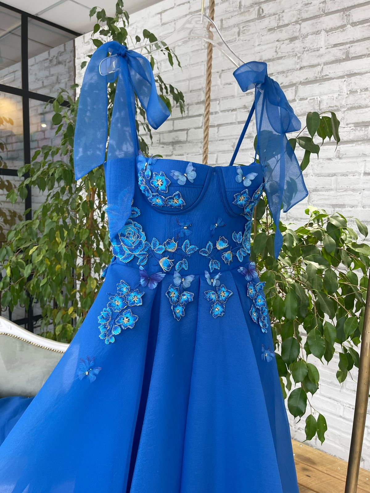 Blue midi dress with spaghetti straps, embroidery and butterflies