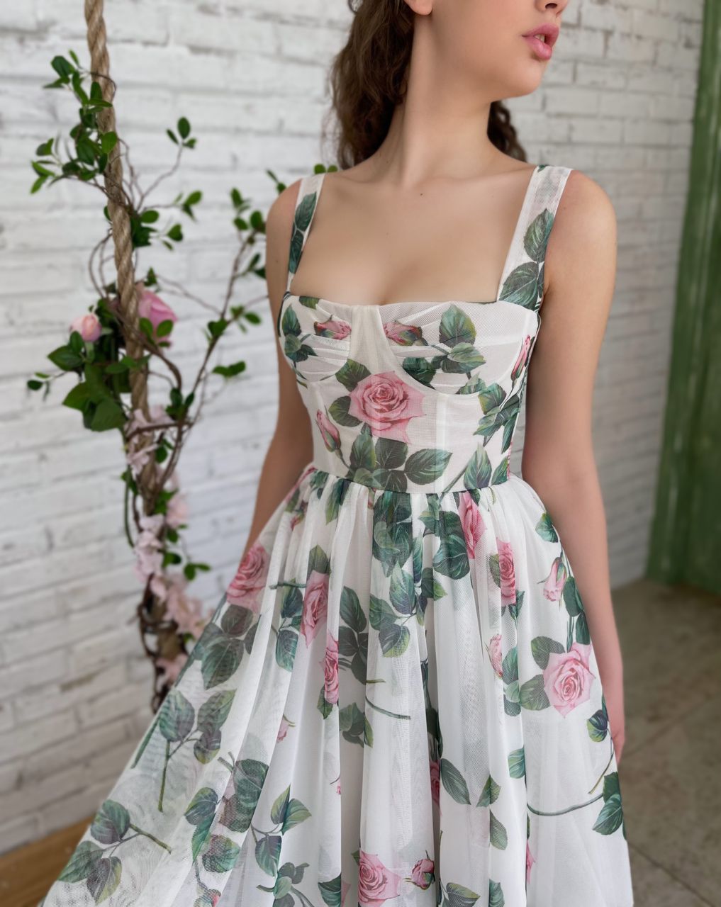 White midi dress with spaghetti straps and printed flowers