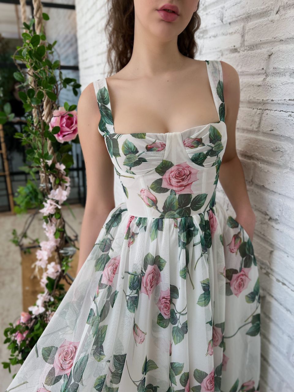 White midi dress with spaghetti straps and printed flowers