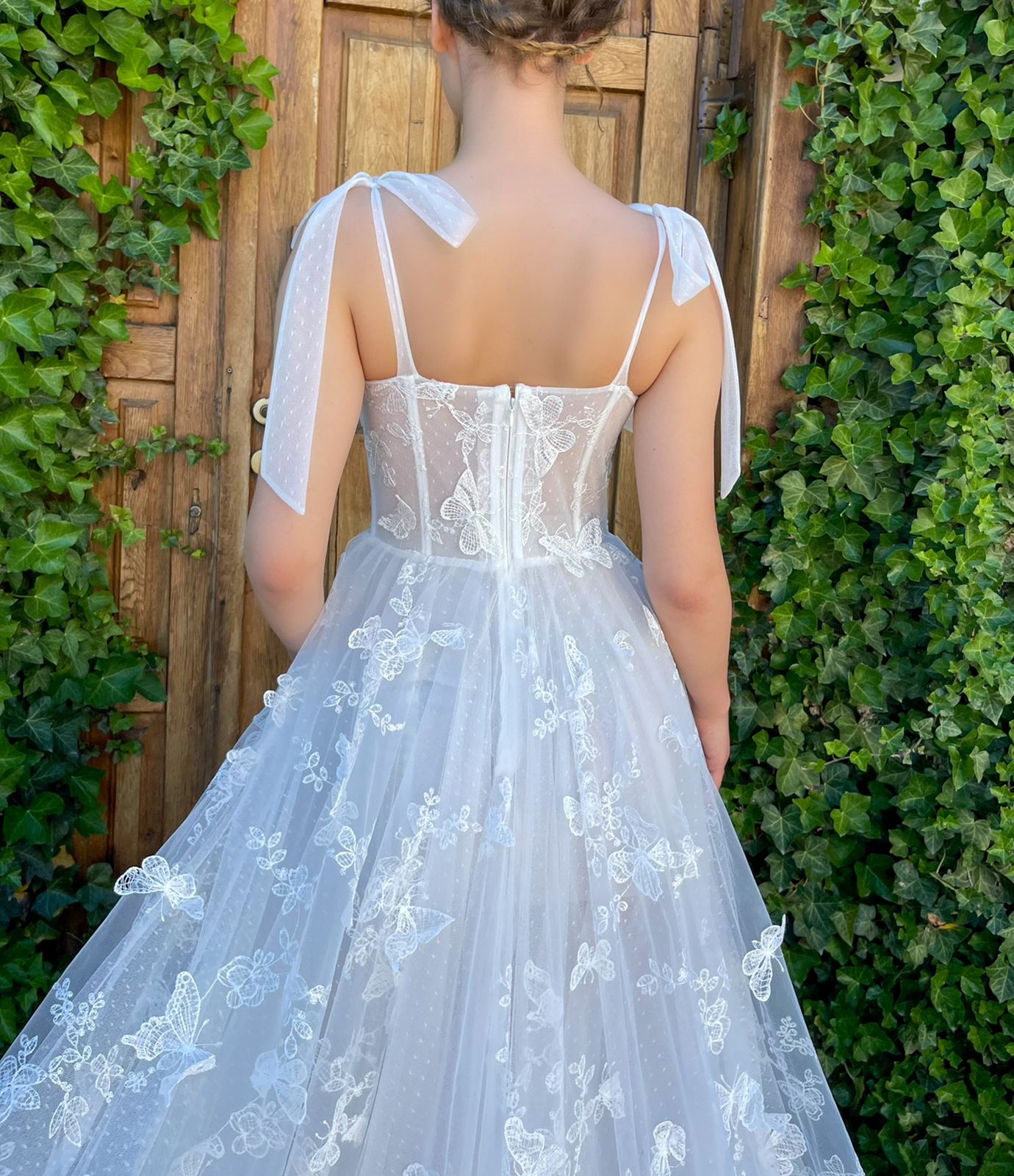 A Line white dress with straps, embroidered butterflies and slit