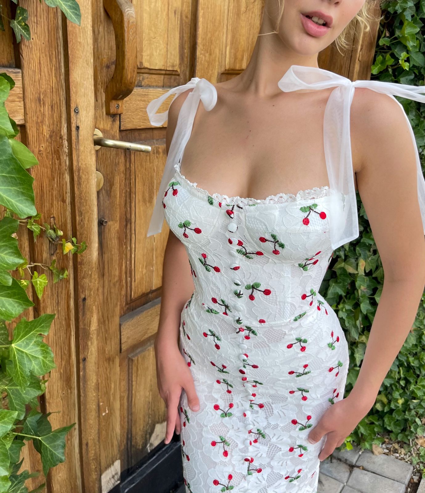 White mermaid dress with spaghetti straps and cherries