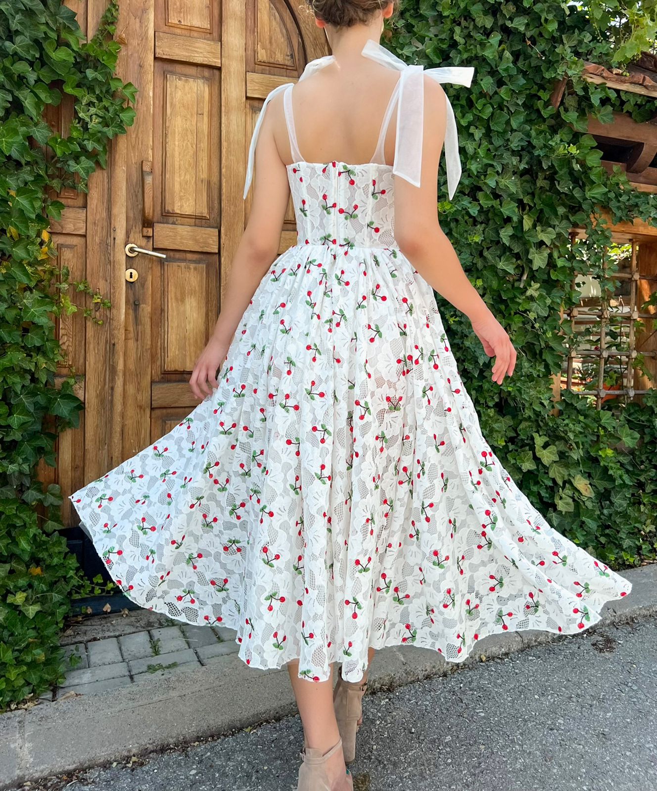 Midi white bridal dress with cherries and straps