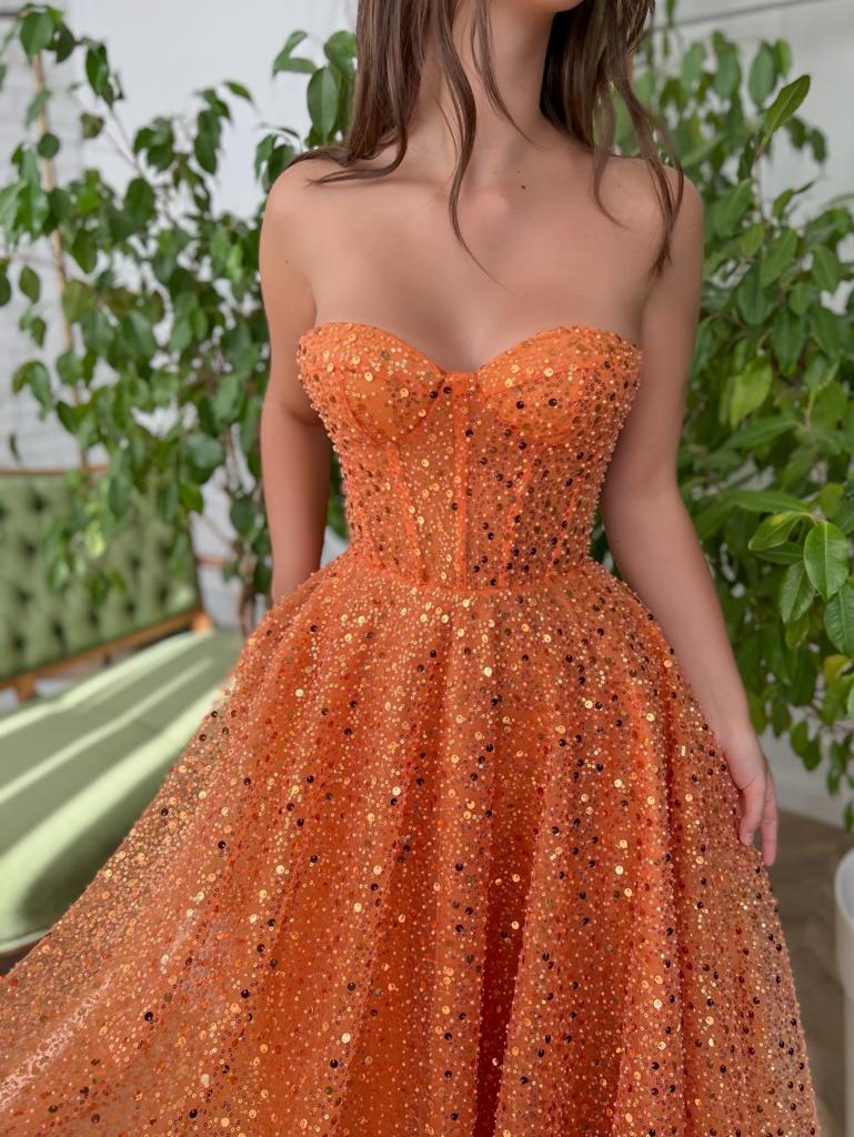 Orange midi dress with cape and no sleeves