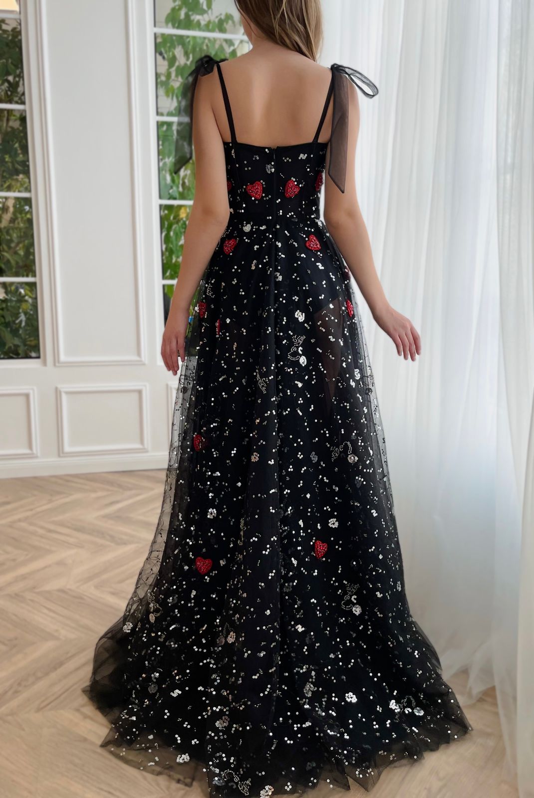Black A-Line dress with bow straps and printed fabric