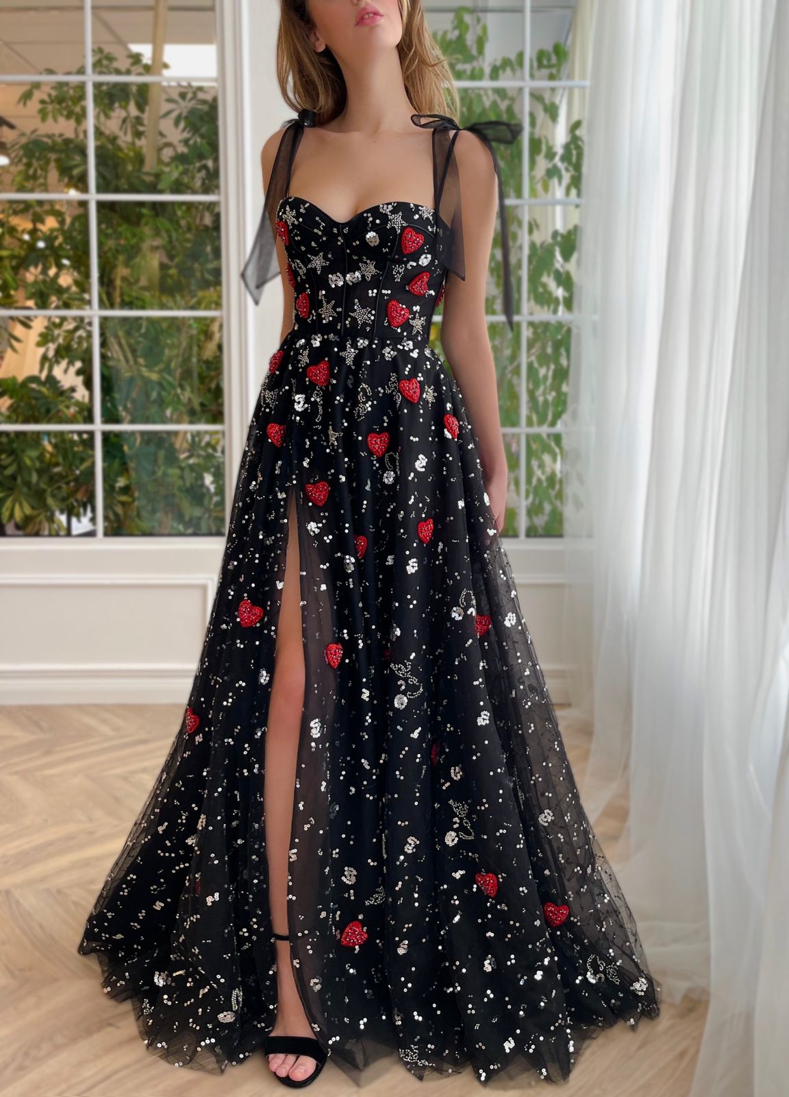 Black A-Line dress with bow straps and printed fabric