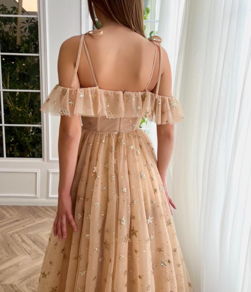 Beige A-Line dress with spaghetti straps, starry fabric and off the shoulder sleeves