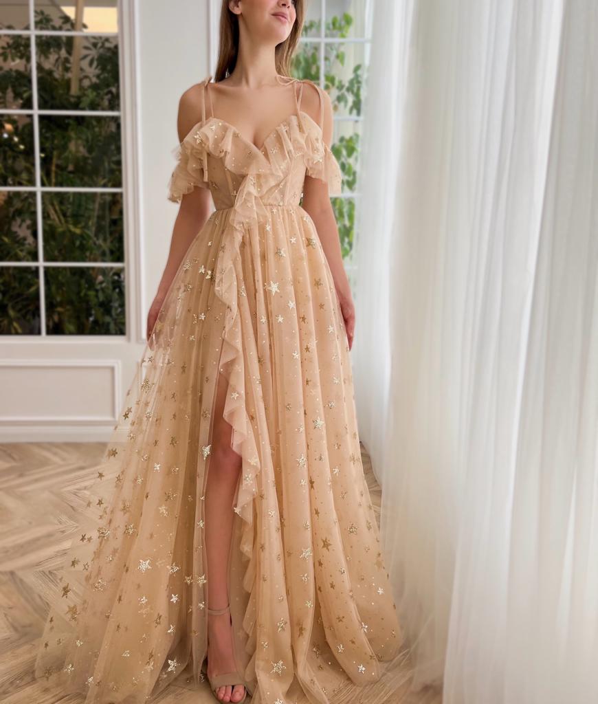 Beige A-Line dress with spaghetti straps, starry fabric and off the shoulder sleeves