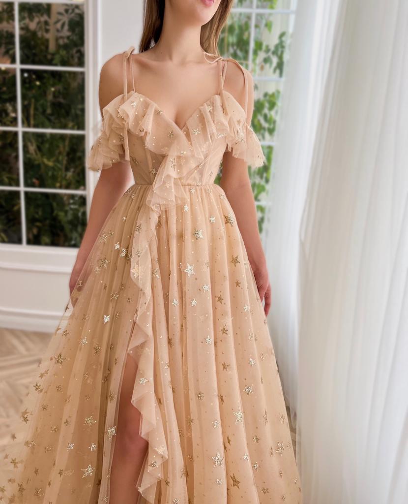 Beige A-Line dress with spaghetti straps, starry fabric and off the shoulder sleeves