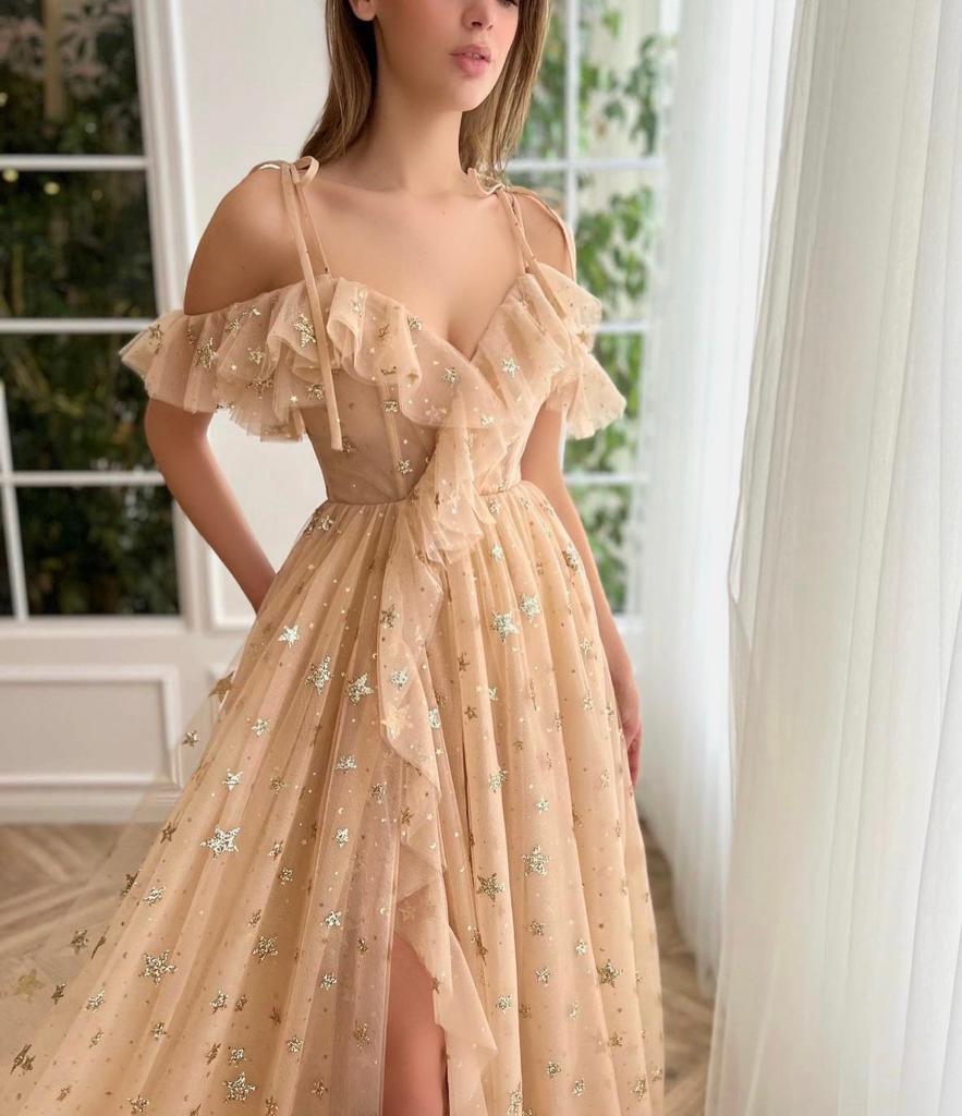 Beige A-Line dress with spaghetti straps, starry fabric and off the shoulder sleeves