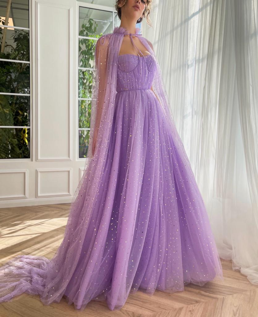 Purple A-Line dress with no sleeves, starry fabric and cape