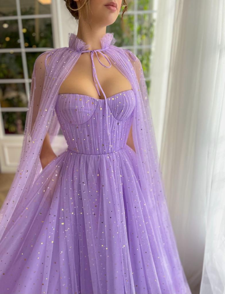 Purple A-Line dress with no sleeves, starry fabric and cape