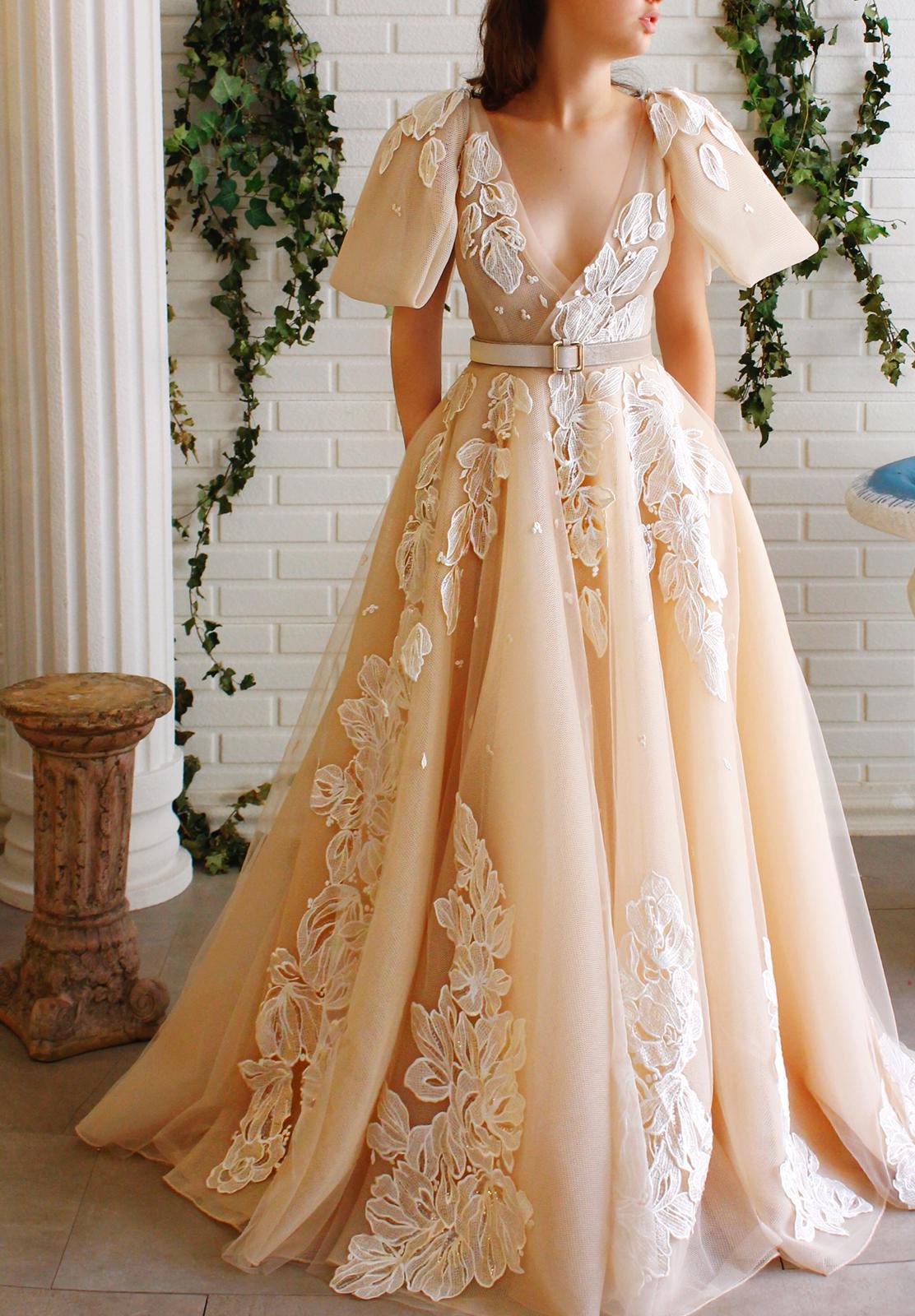 Beige A-Line dress with v-neck, short sleeves, belt and embroidery